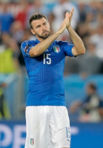 Italy's Andrea Barzagli applauds fans at the end of the Euro 2016 quarterfinal soccer match between Germany and Italy, at the Nouveau Stade in Bordeaux, France, Saturday, July 2, 2016. Germany beat Italy 6-5 in a penalty shootout. (AP Photo/Antonio Calann